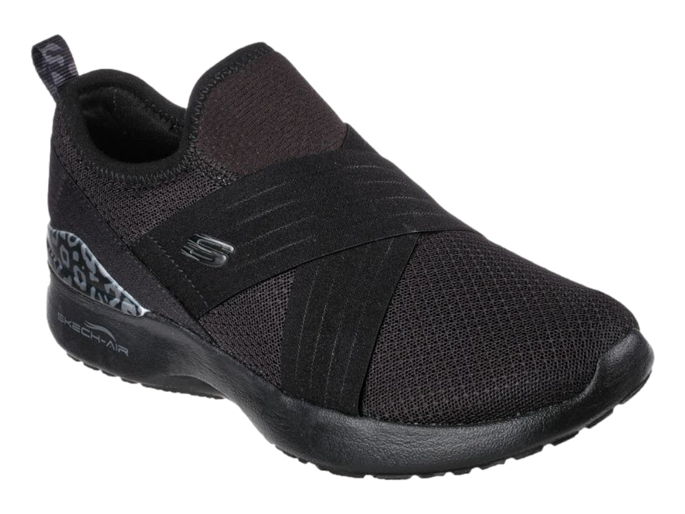 Zapato deportivo Skechers para mujer en color negro, estilo slip-on con detalle decorativo en el talón.