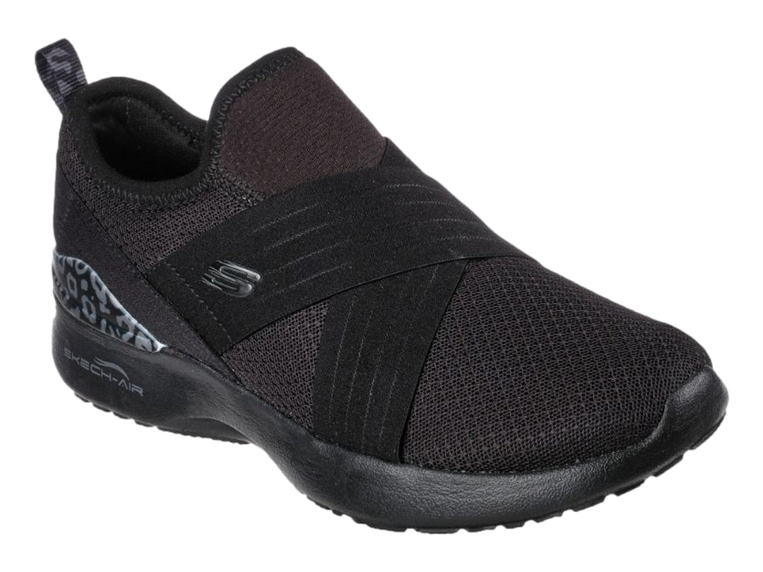 Zapato deportivo Skechers para mujer en color negro, estilo slip-on con detalle decorativo en el talón.