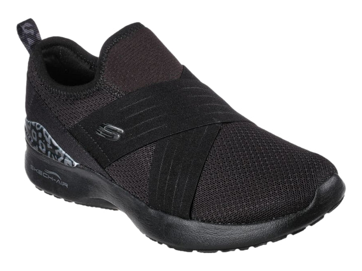 Zapato deportivo Skechers para mujer en color negro, estilo slip-on con detalle decorativo en el talón.