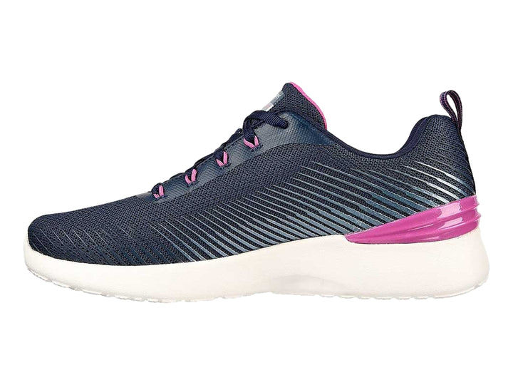 Tenis deportivos Skechers para mujer en color azul marino con detalles en rosa y suela blanca.