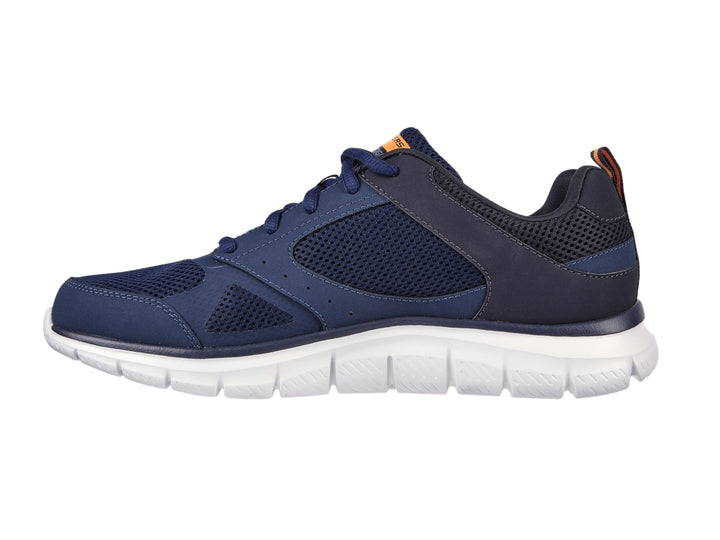 Tenis deportivos Skechers color azul marino con suela blanca y detalles naranjas.