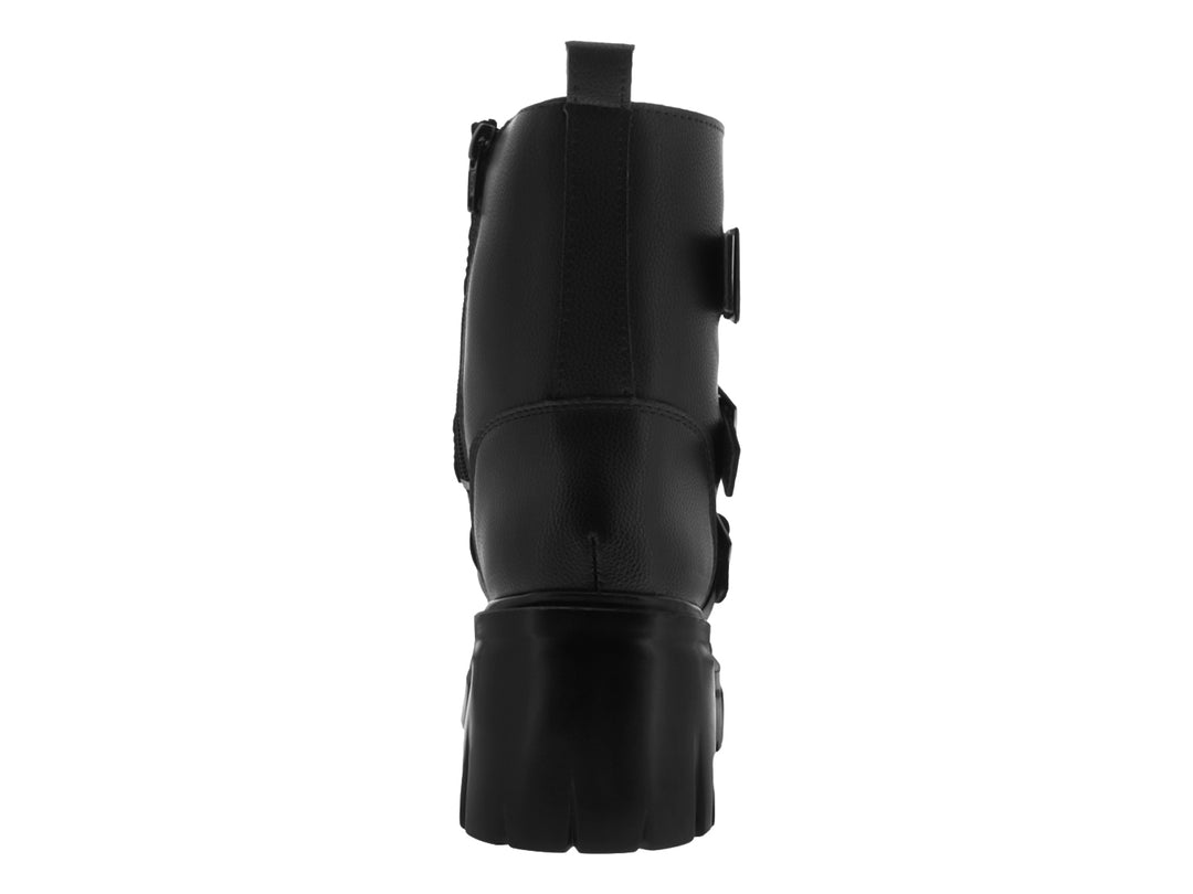 Bota negra de plataforma con tres hebillas plateadas y suela track.