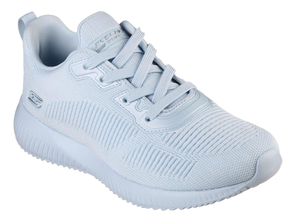 Tenis Skechers BOBS en color azul claro con tejido transpirable y suela blanca coordinada.
