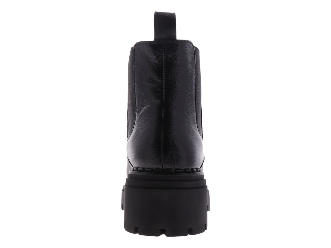 Botas Chelsea negras para niña con suela track gruesa y acabado liso.