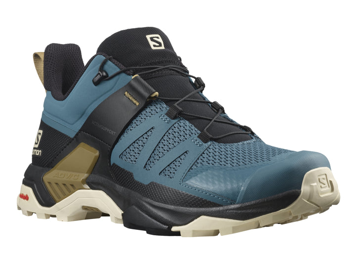 Zapato deportivo Salomon X Ultra 4 en color azul mallard, negro y beige para senderismo.