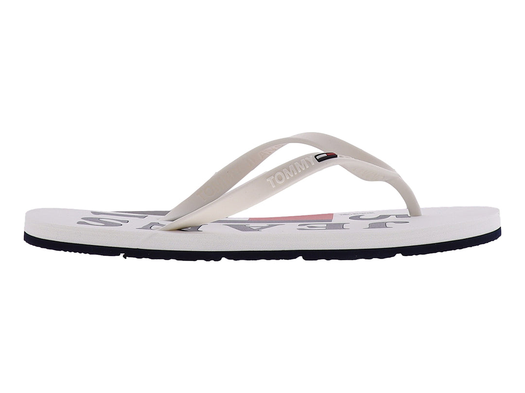 Sandalias Tommy Hilfiger blancas con suela azul marino y tiras sintéticas.