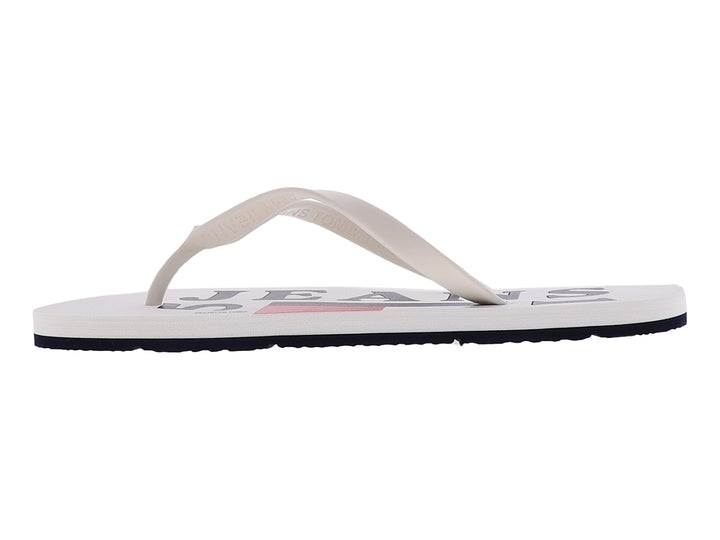Sandalias Tommy Hilfiger blancas con suela azul marino y tiras sintéticas.