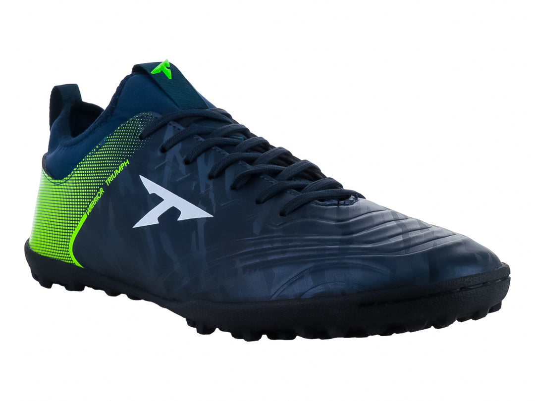 Zapato de fútbol Leon Trucco color marino con detalles en verde neón y suela para turf.