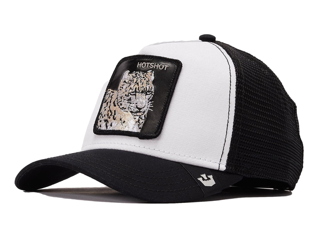 Gorra Goorin Bros blanca y negra con parche frontal de leopardo y malla trasera.
