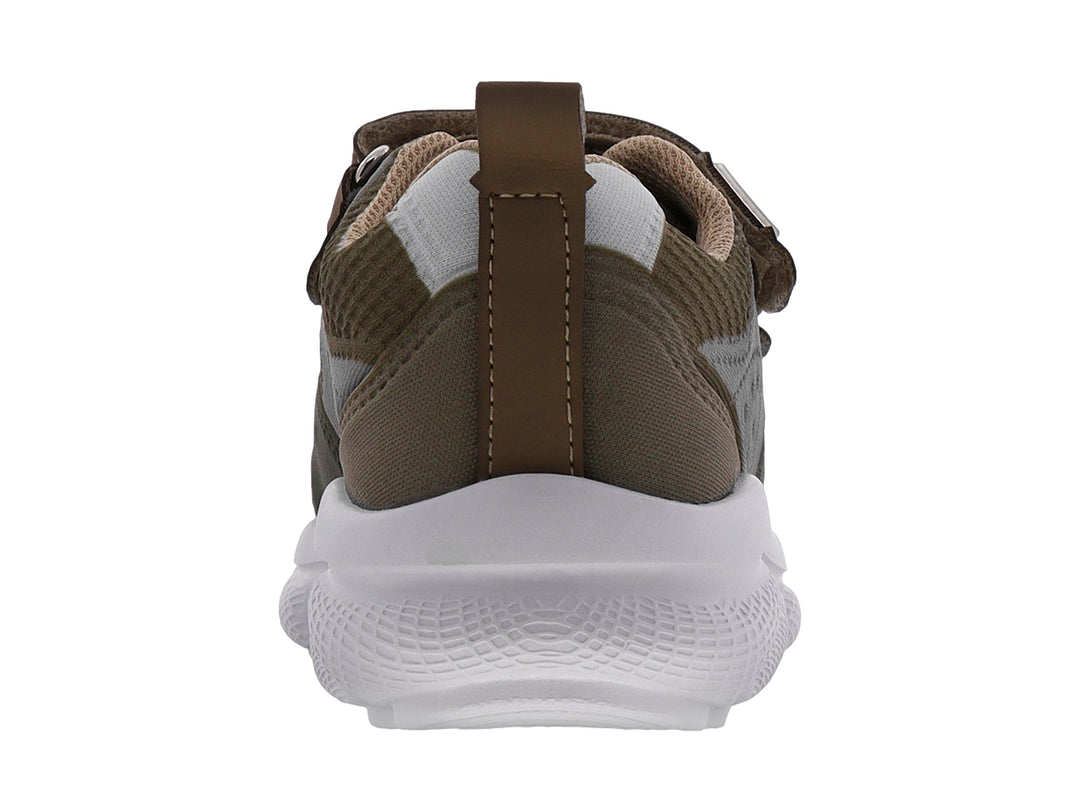 Zapato deportivo para niño en color verde con suela blanca y cierre de velcro.