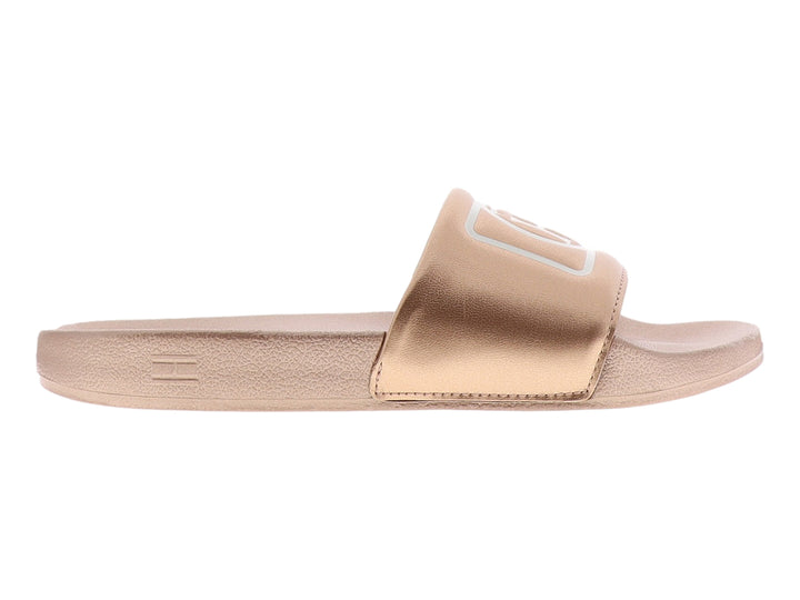 Sandalia tipo slide Tommy Hilfiger en color rosegold con acabado brillante y logo frontal.