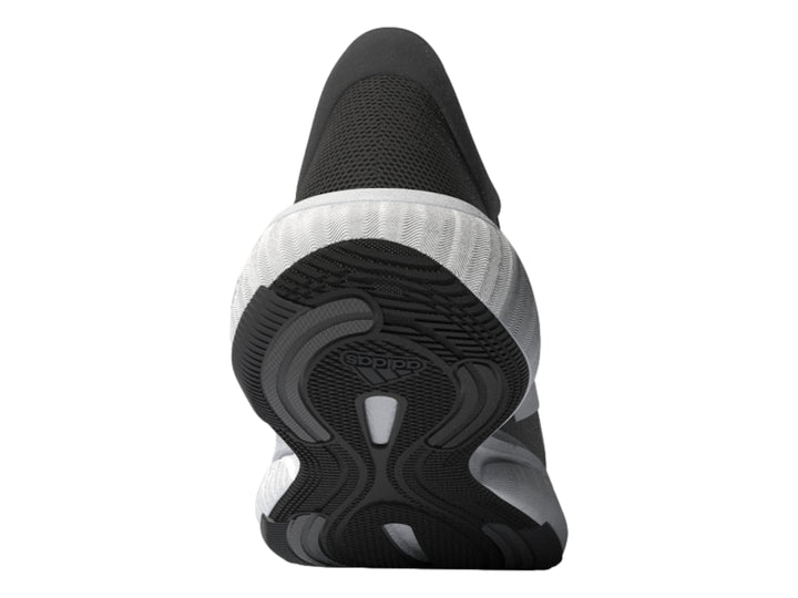 Tenis deportivos Adidas Response color negro con tres franjas blancas y suela blanca.