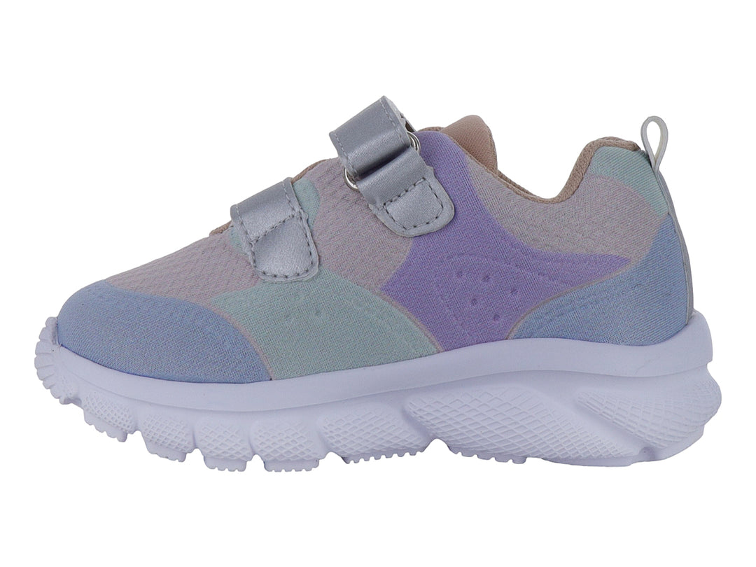 Tenis deportivos infantiles multicolor en tonos pastel con cierre de velcro y suela blanca.
