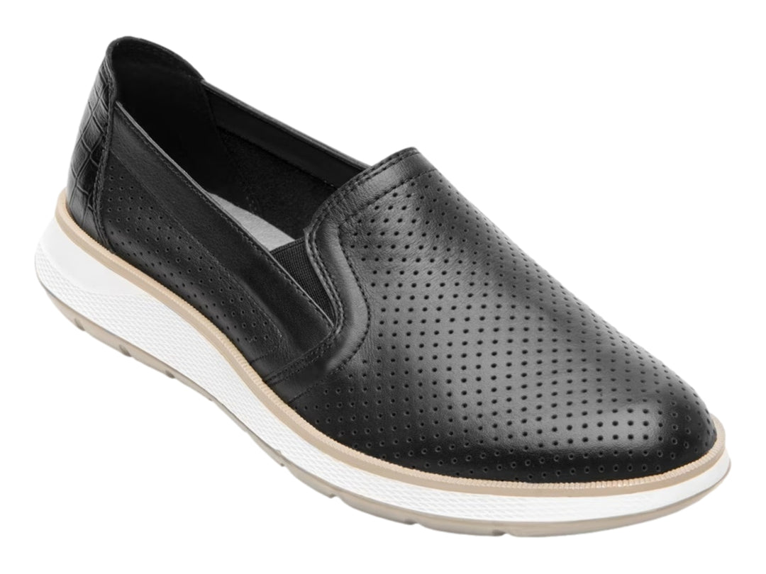 Zapato plano Flexi color negro de cuero perforado con suela blanca y beige para mujer.