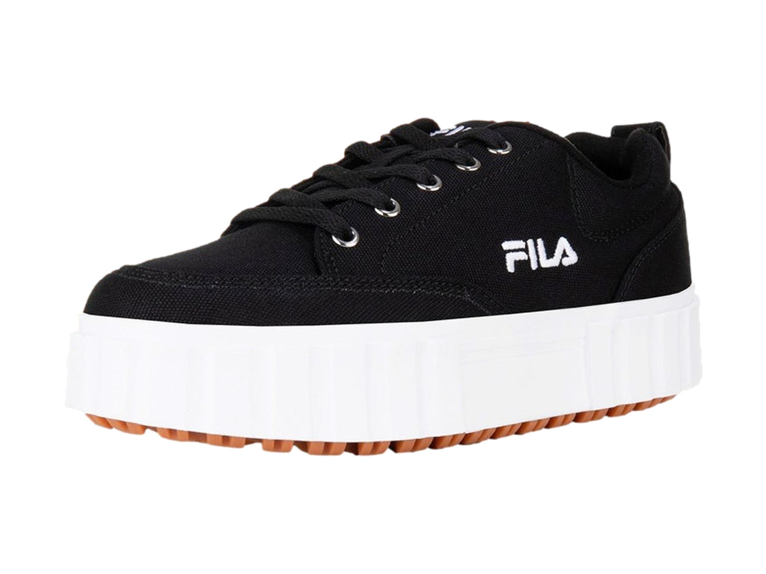Tenis FILA negros con suela de plataforma blanca y base color café.
