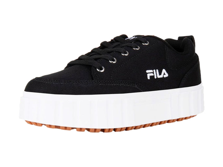 Tenis FILA negros con suela de plataforma blanca y base color café.