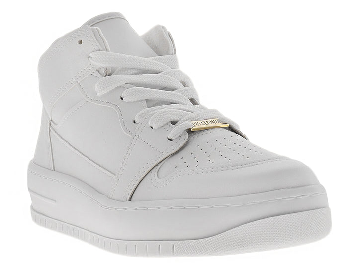 Tenis Vizzano color blanco con detalles dorados, diseño casual y suela plana sobre fondo blanco.