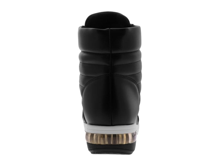Botín negro para mujer con suela blanca y detalles dorados en los ojillos.