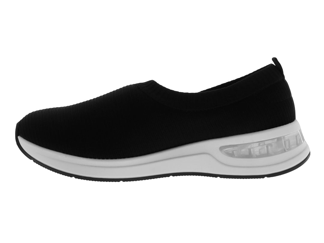 Zapato Modare slip-on de tejido negro con suela blanca gruesa y cómoda.
