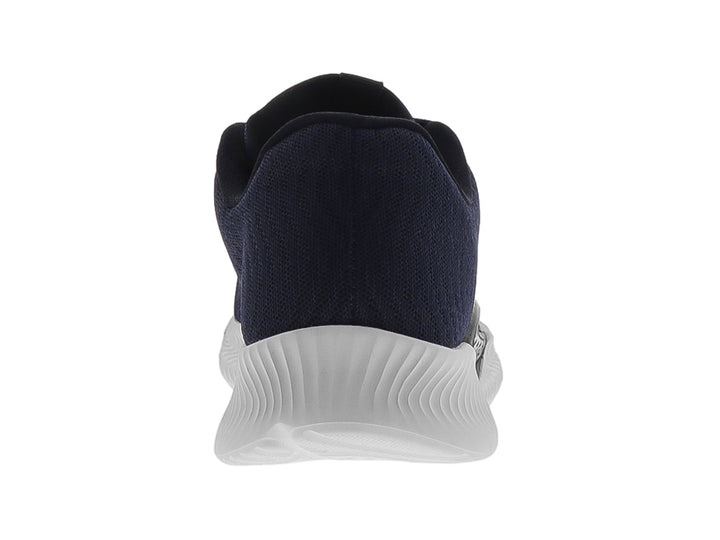 Tenis deportivo Actvitta de color azul marino con suela blanca y tejido transpirable.