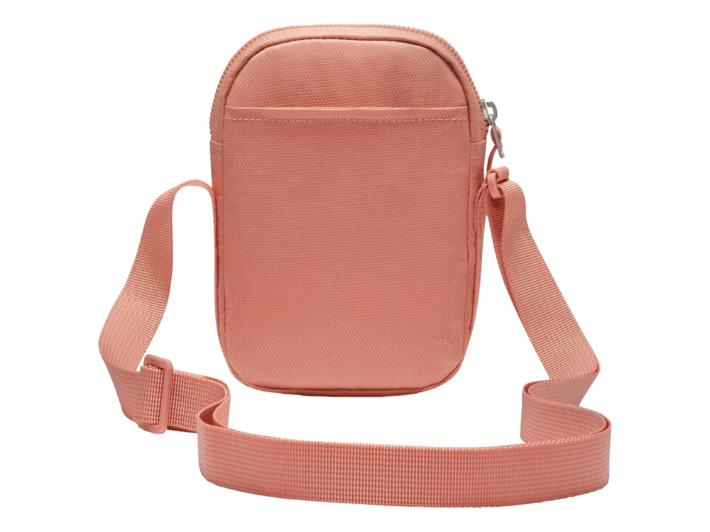 Bolsa de hombro Nike Heritage S en color rosa LT Madder Root con diseño de malla frontal y correa ajustable.
