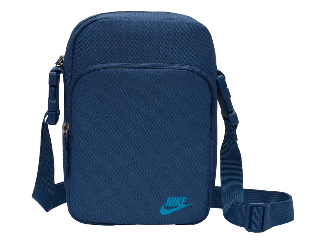 Bolsa de hombro Nike Heritage en color azul marino con logotipo Laser Blue y correa ajustable.
