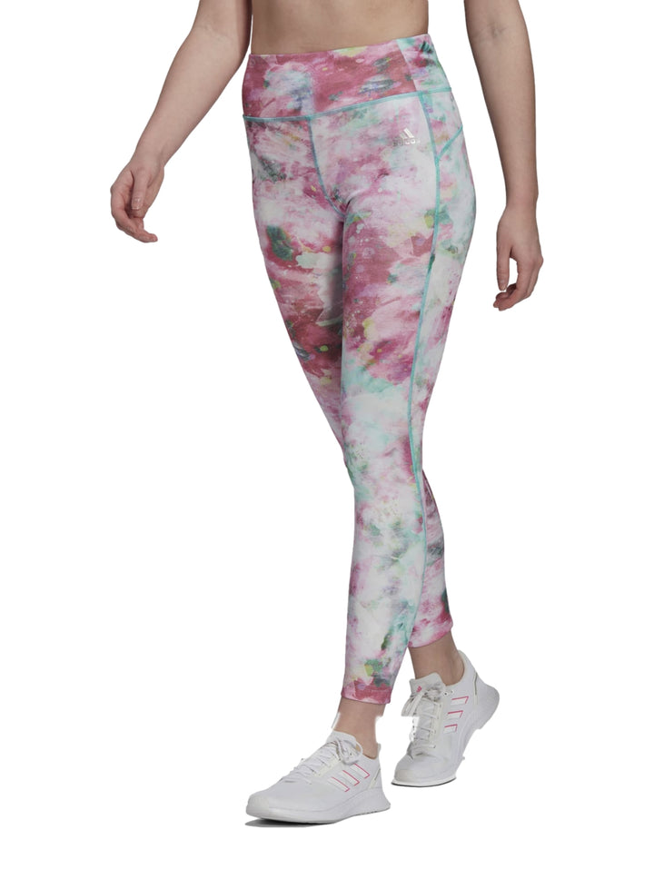 Leggings deportivos Adidas con estampado multicolor en tonos rosa y verde menta.