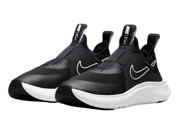 Tenis Nike Flex Plus color negro con suela blanca, estilo slip-on deportivo.