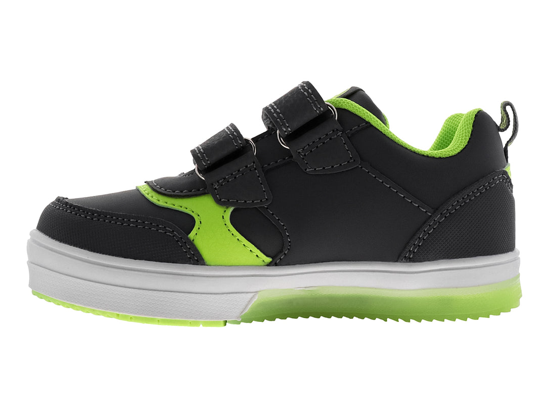 Tenis infantiles color gris con detalles en verde neón, cierre de velcro y diseño de cohete lateral.