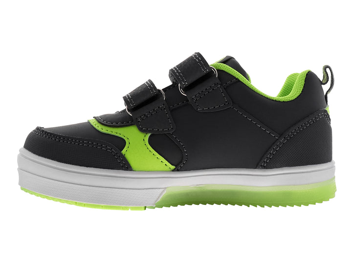 Tenis infantiles color gris con detalles en verde neón, cierre de velcro y diseño de cohete lateral.