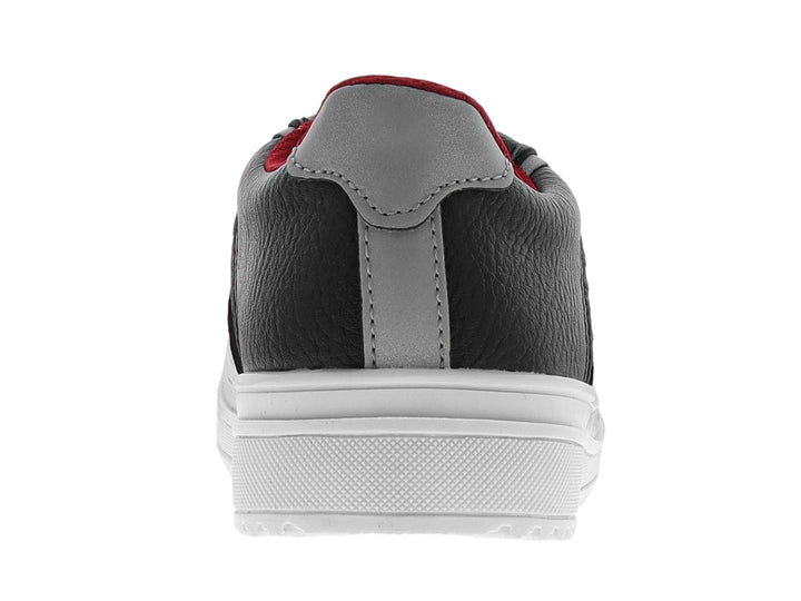 Tenis infantiles Chabelo color negro con suela y cordones blancos y detalles en rojo.