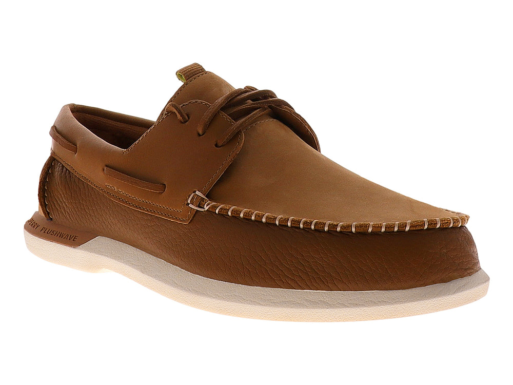 Zapato náutico Sperry de cuero color tan con suela blanca y cordones.