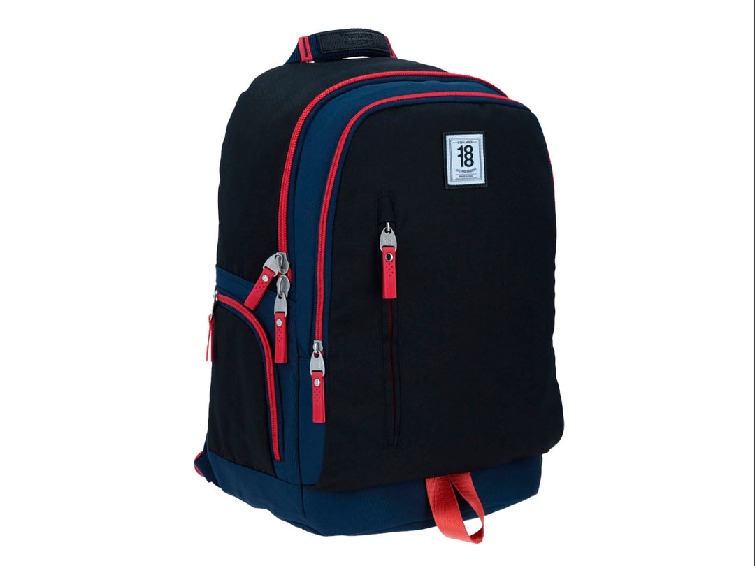 Mochila escolar Chenson color azul marino con detalles y cierres en color rojo.