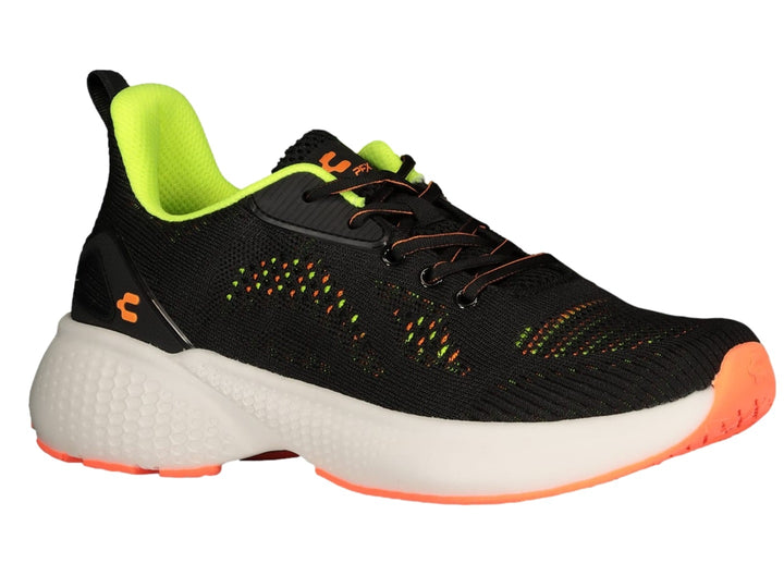Tenis deportivos Charly en color negro con suela blanca y detalles en verde lima y naranja.