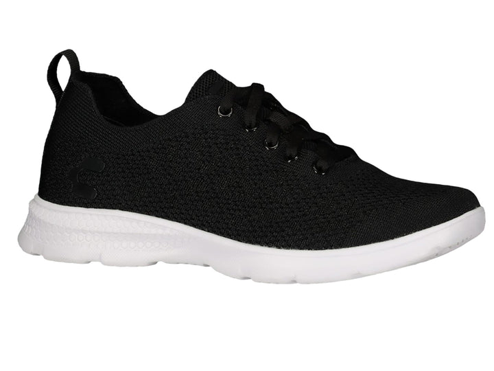 Tenis deportivos Charly de color negro con suela blanca y tejido transpirable.