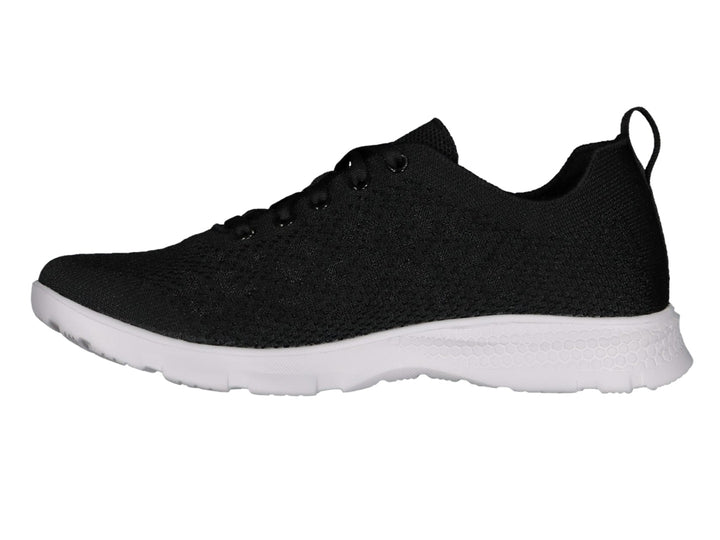 Tenis deportivos Charly de color negro con suela blanca y tejido transpirable.