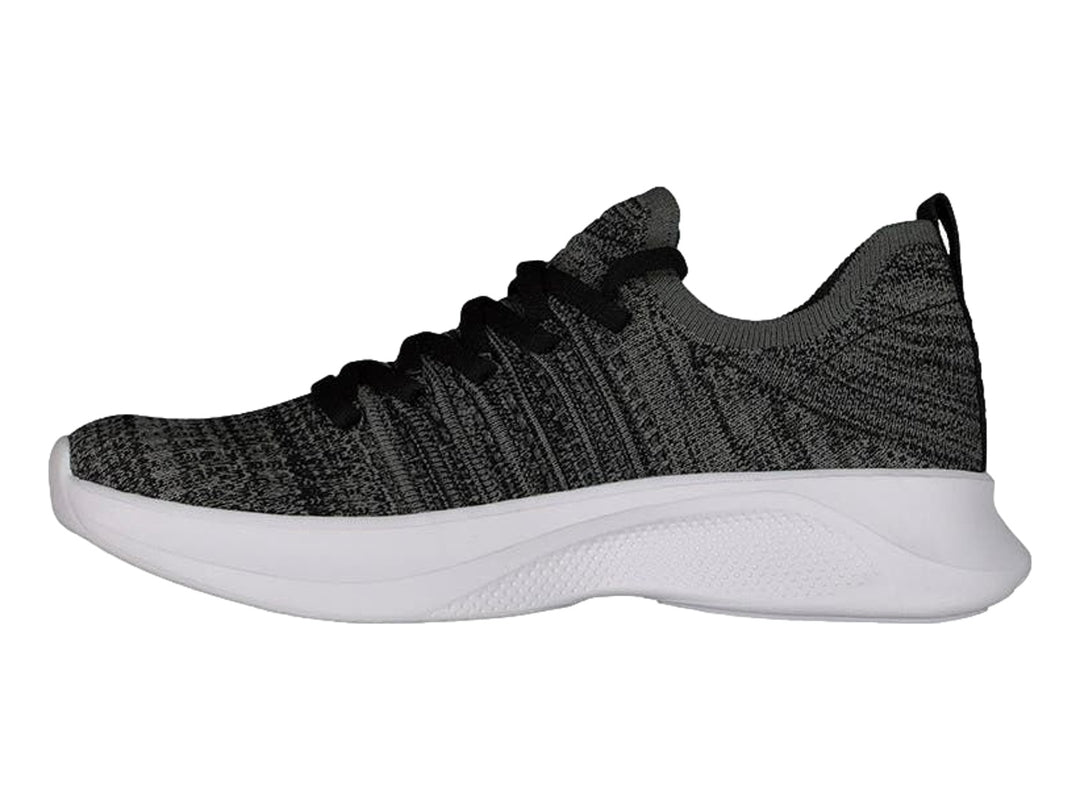Tenis deportivos Charly de tela tejida en color negro y gris con suela blanca.