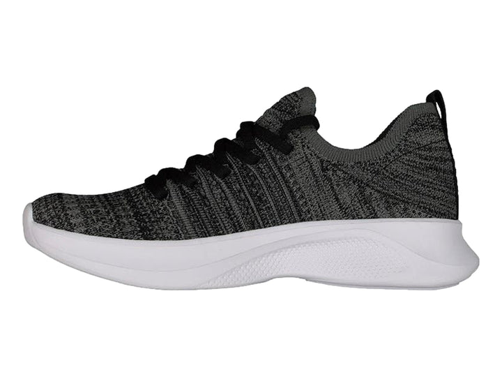 Tenis deportivos Charly de tela tejida en color negro y gris con suela blanca.