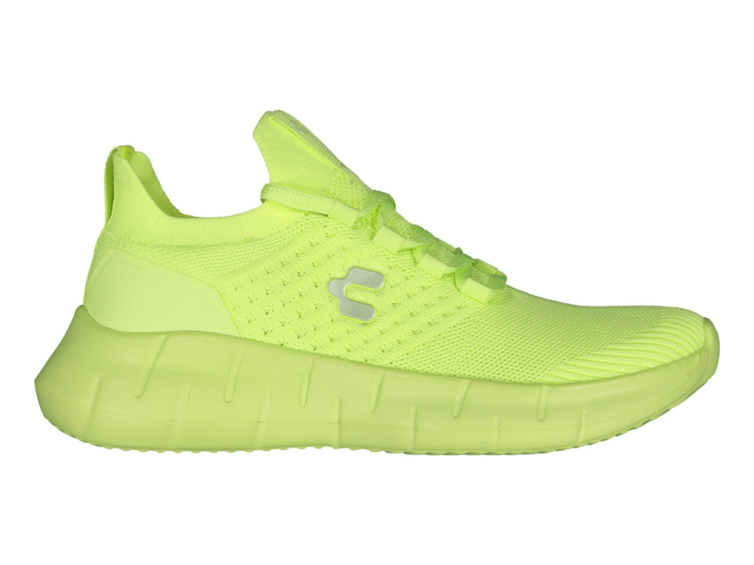 Tenis deportivos Charly de color amarillo lima con tejido transpirable y suela gruesa.