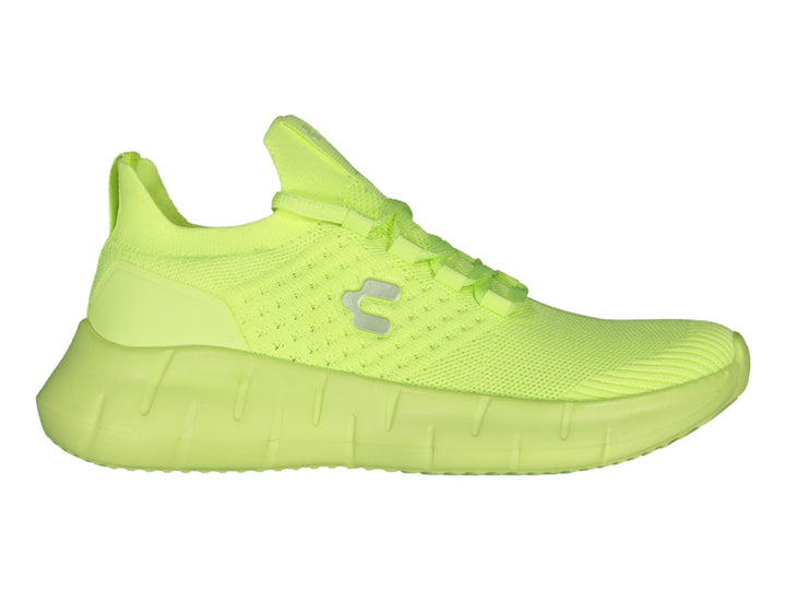 Tenis deportivos Charly de color amarillo lima con tejido transpirable y suela gruesa.
