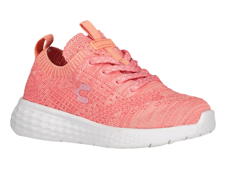 Tenis deportivos Charly en color coral con suela blanca y tejido transpirable.