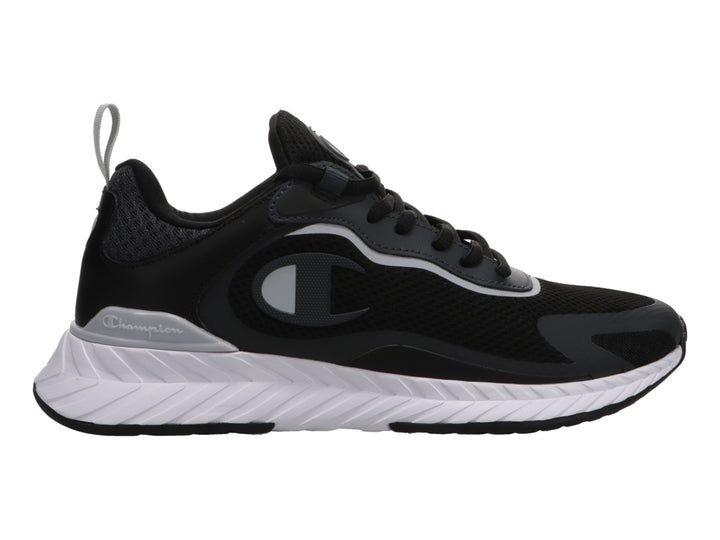 Tenis deportivos Champion color negro con suela blanca y detalles en gris.