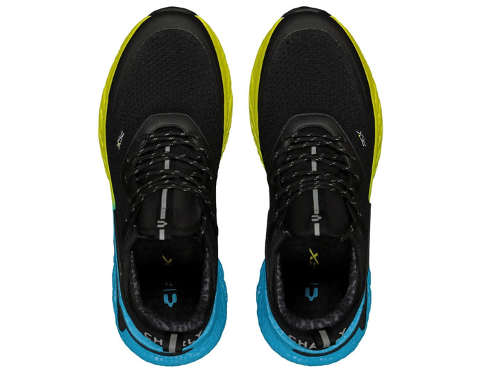 Tenis deportivos Charly color negro con suela en degradado de aqua a amarillo.
