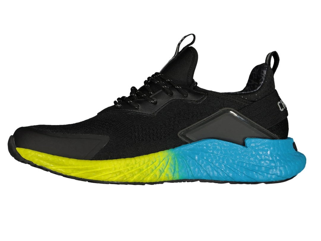 Tenis deportivos Charly color negro con suela en degradado de aqua a amarillo.
