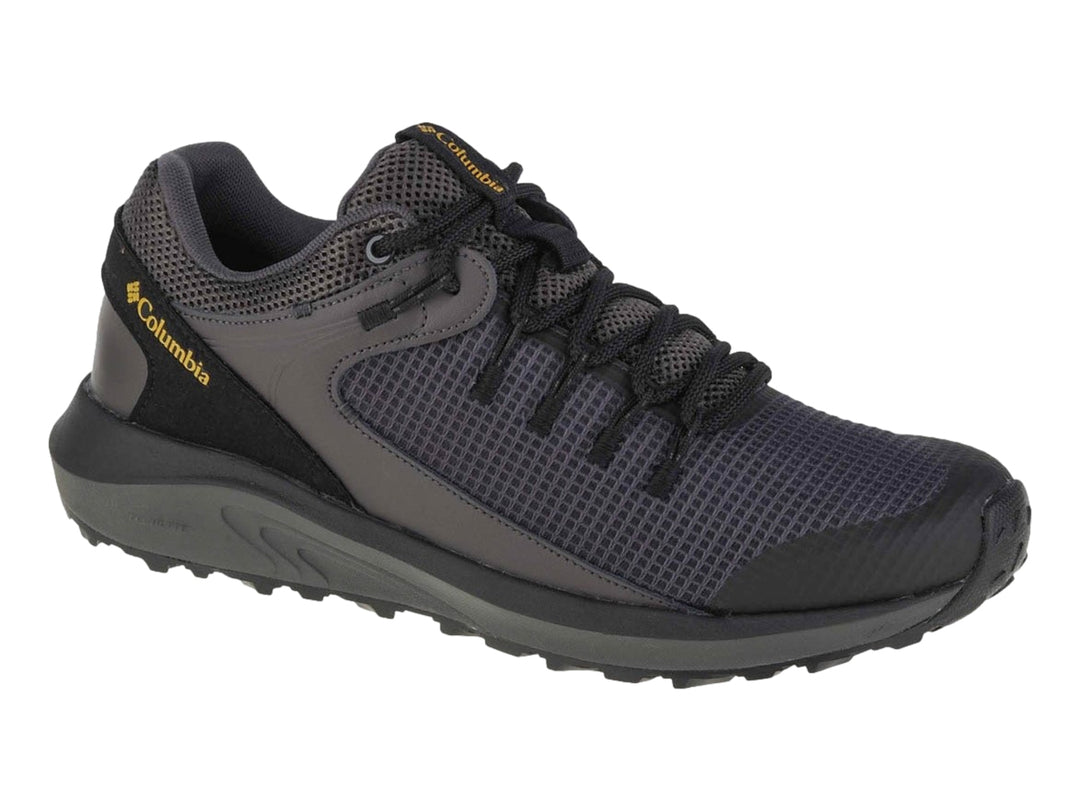 Zapato deportivo Columbia Trailstorm en color gris oscuro con detalles en negro y suela para trail.
