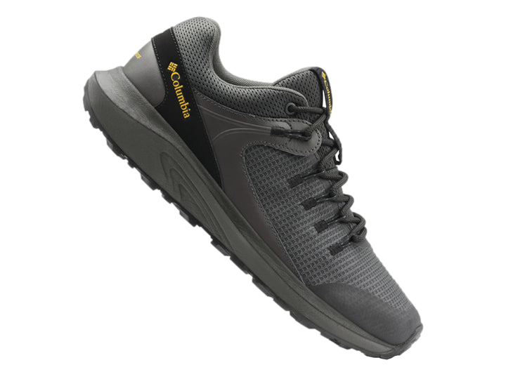 Zapato deportivo Columbia Trailstorm en color gris oscuro con detalles en negro y suela para trail.