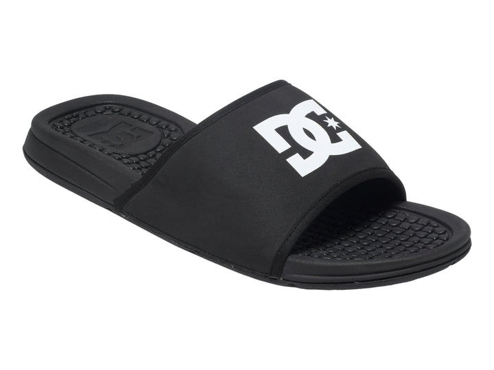 Sandalia tipo slider color negro con logotipo blanco de DC Shoes en la banda superior.