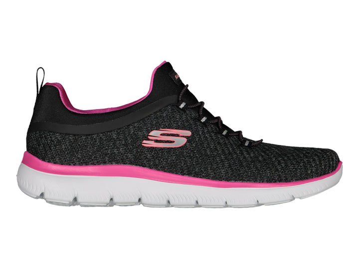 Tenis deportivos Skechers para mujer en color negro con detalles en rosa y suela blanca.