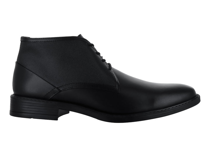 Botín negro para hombre con combinación de cuero y textil y cierre de agujetas.