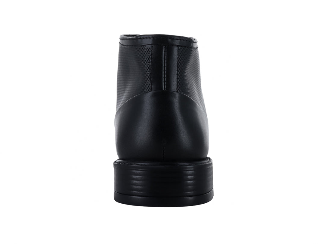 Botín negro para hombre con combinación de cuero y textil y cierre de agujetas.